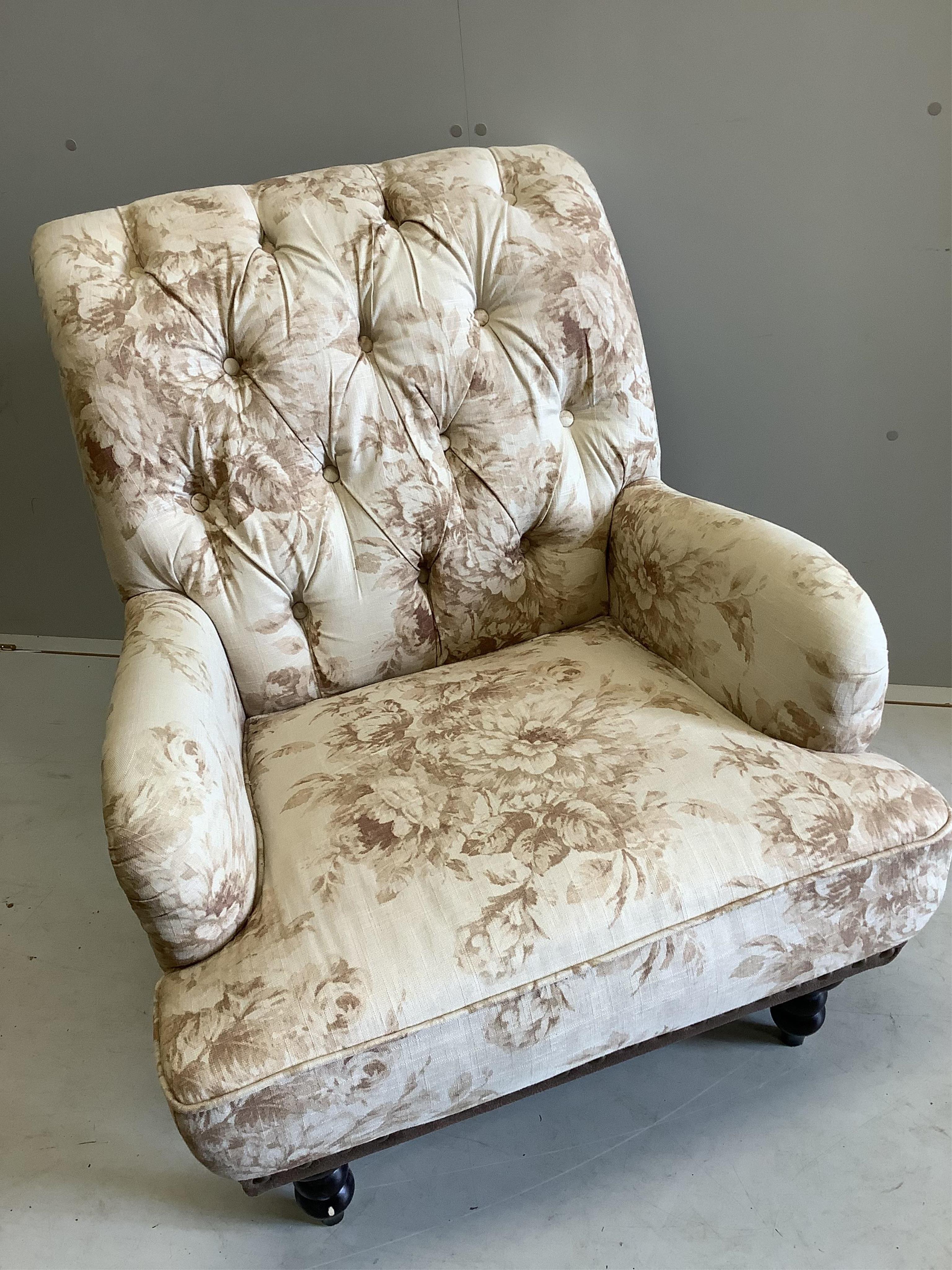 A reproduction Victorian style upholstered armchair, width 76cm, depth 80cm, height 86cm